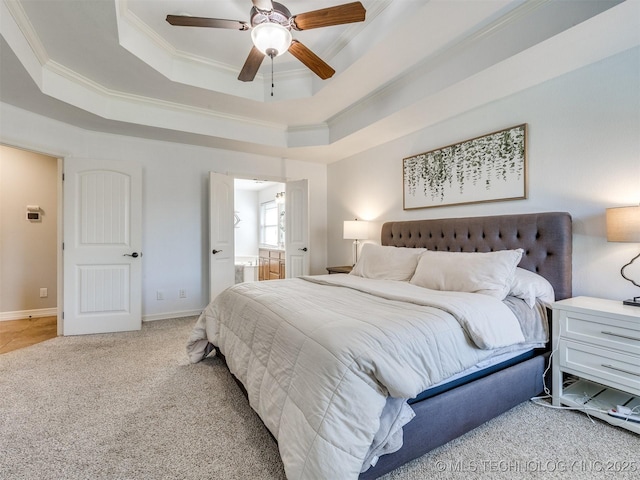 2603 S 16th Pl, Broken Arrow, OK 74012 - bedroom featuring ornamental molding, a raised ceiling, light colored carpet, ensuite bathroom, and ceiling fan