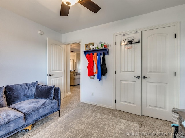 2603 S 16th Pl, Broken Arrow, OK 74012 - living area featuring a ceiling fan and carpet flooring