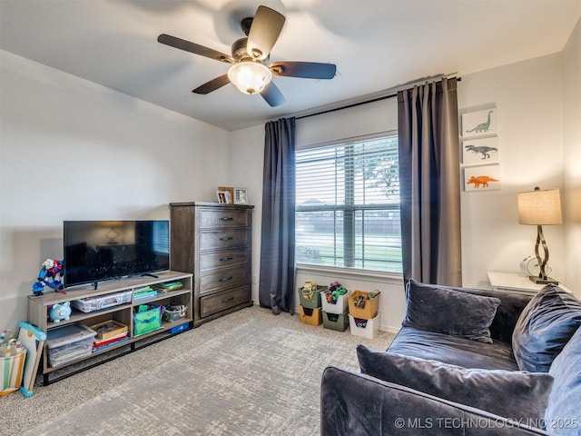 2603 S 16th Pl, Broken Arrow, OK 74012 - living area featuring a ceiling fan and carpet