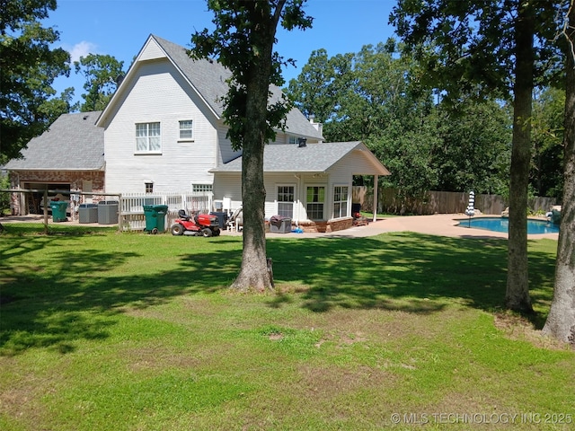 501 W 35th Pl, Sand Springs, OK 74063 - rear view of property with roof with shingles and a patio area