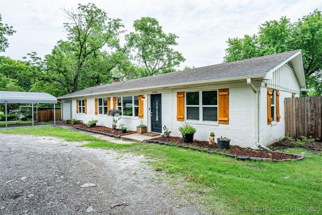 11598 E Oak St, Claremore, OK 74019 - ranch-style home with brick siding, driveway, roof with shingles, and a detached carport