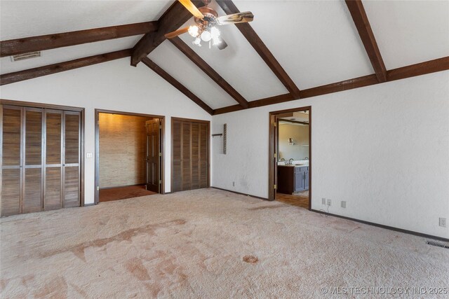 17304 E 176th St S, Bixby, OK 74008 - unfurnished bedroom with beamed ceiling, carpet, two closets, ensuite bathroom, and ceiling fan
