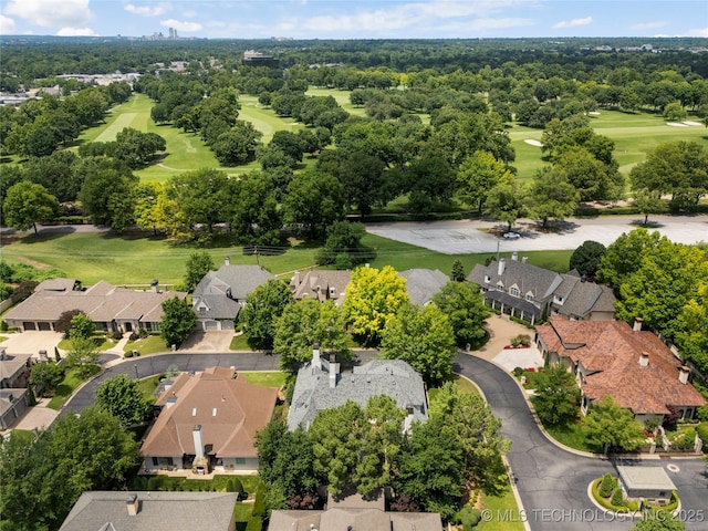 2524 E 66th Pl, Tulsa, OK 74136 - aerial perspective of suburban area with a golf course and a tree filled landscape