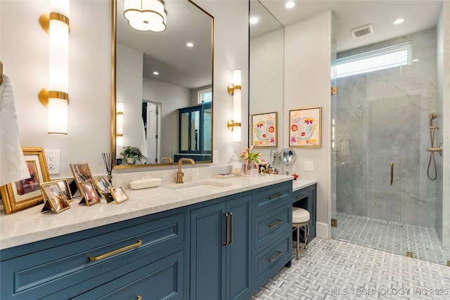 2524 E 66th Pl, Tulsa, OK 74136 - bathroom with vanity, a stall shower, and recessed lighting
