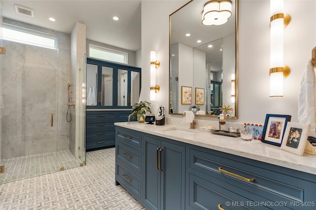 2524 E 66th Pl, Tulsa, OK 74136 - bathroom with a stall shower, vanity, and recessed lighting