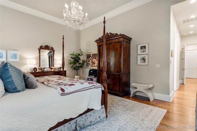 2524 E 66th Pl, Tulsa, OK 74136 - bedroom with light wood-style floors, a chandelier, and crown molding