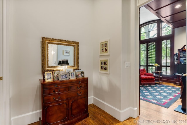 2524 E 66th Pl, Tulsa, OK 74136 - hallway with light wood-type flooring and healthy amount of natural light