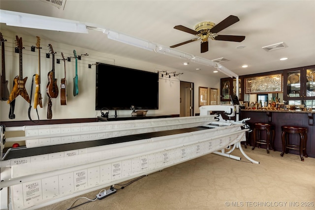 2524 E 66th Pl, Tulsa, OK 74136 - misc room featuring bar, a ceiling fan, and recessed lighting
