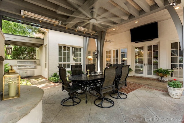 2524 E 66th Pl, Tulsa, OK 74136 - view of patio featuring french doors, ceiling fan, outdoor dining space, and an outdoor kitchen