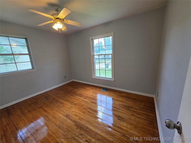 1435 E Jones Ave, Sapulpa, OK 74066 - unfurnished room with hardwood / wood-style flooring and a ceiling fan