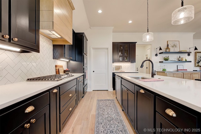 7117 E Queens St, Broken Arrow, OK 74014 - kitchen featuring ornamental molding, appliances with stainless steel finishes, decorative backsplash, light countertops, and pendant lighting