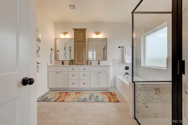 7117 E Queens St, Broken Arrow, OK 74014 - full bathroom featuring a bath, double vanity, tile patterned flooring, and a shower with shower door
