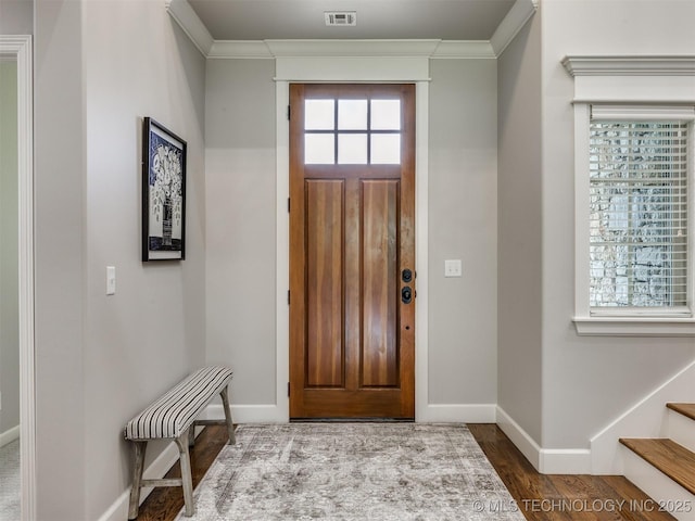 5509 E 121st Pl S, Tulsa, OK 74008 - foyer entrance with ornamental molding, wood finished floors, and stairway