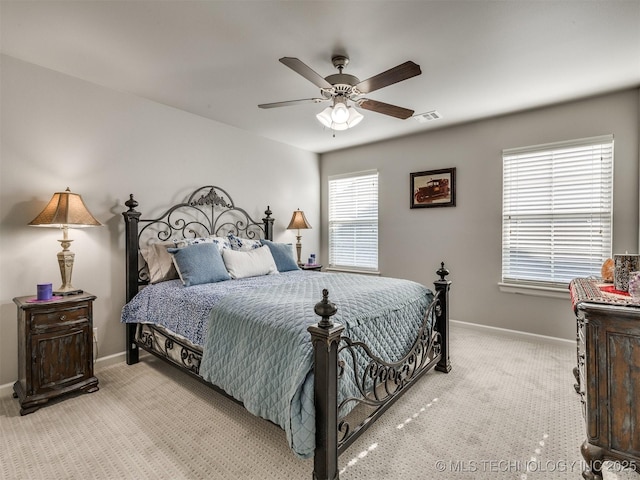 5509 E 121st Pl S, Tulsa, OK 74008 - bedroom featuring carpet floors and a ceiling fan
