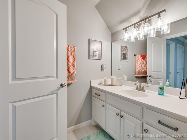 5509 E 121st Pl S, Tulsa, OK 74008 - bathroom with vanity and vaulted ceiling