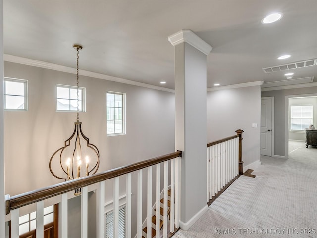 5509 E 121st Pl S, Tulsa, OK 74008 - hall featuring ornamental molding, carpet, recessed lighting, a chandelier, and an upstairs landing