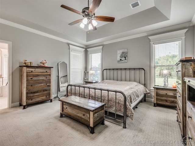 5509 E 121st Pl S, Tulsa, OK 74008 - bedroom with a tray ceiling, light carpet, crown molding, and ceiling fan