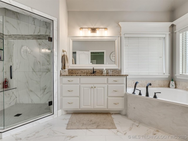 5509 E 121st Pl S, Tulsa, OK 74008 - bathroom with marble look tiles, a bath, a marble finish shower, and vanity