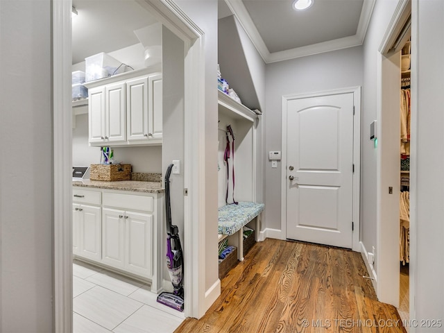 5509 E 121st Pl S, Tulsa, OK 74008 - mudroom with crown molding and light wood finished floors
