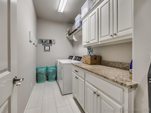 5509 E 121st Pl S, Tulsa, OK 74008 - laundry area with washer and dryer and cabinet space