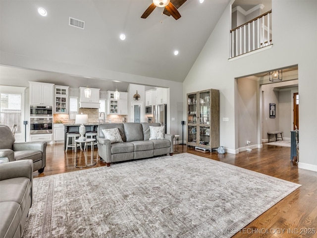 5509 E 121st Pl S, Tulsa, OK 74008 - living area featuring high vaulted ceiling, a ceiling fan, dark wood-style floors, and recessed lighting