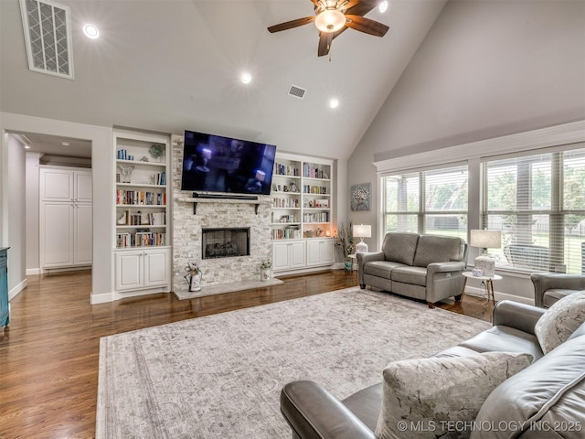 5509 E 121st Pl S, Tulsa, OK 74008 - living room featuring high vaulted ceiling, ceiling fan, a fireplace, recessed lighting, and wood finished floors