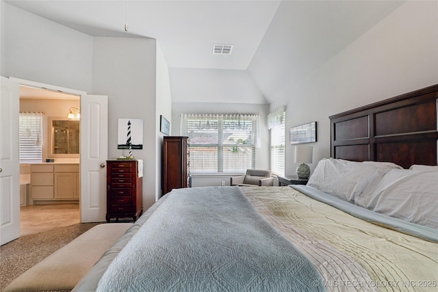 6904 S Chestnut Ave, Broken Arrow, OK 74011 - carpeted bedroom with high vaulted ceiling and ensuite bath