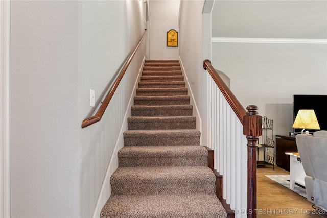6904 S Chestnut Ave, Broken Arrow, OK 74011 - stairs featuring wood finished floors and arched walkways