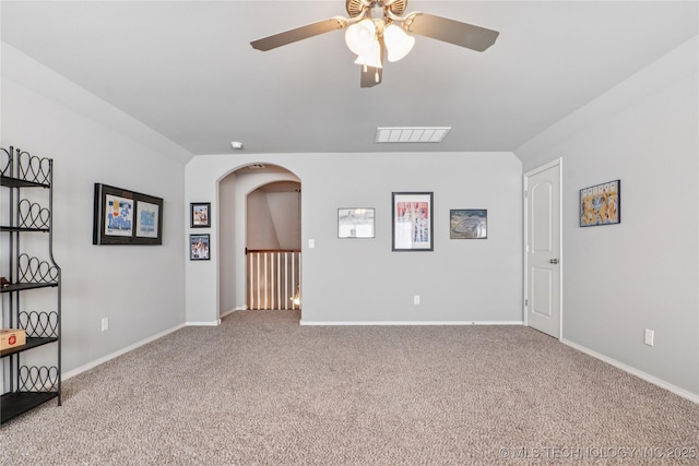 6904 S Chestnut Ave, Broken Arrow, OK 74011 - carpeted spare room featuring arched walkways and ceiling fan