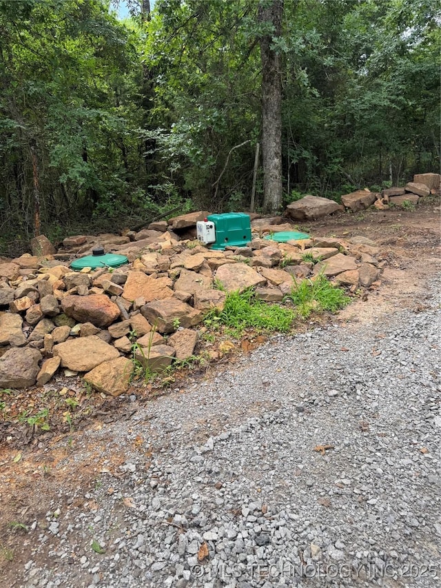 33455 State Highway 82, Cookson, OK 74427 - exterior view of a heavily wooded area