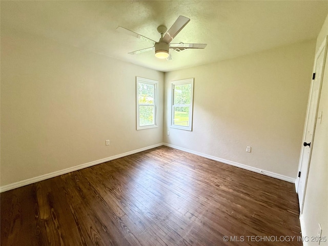 206 S 2nd St, Eufaula, OK 74432 - empty room with dark wood-style flooring and ceiling fan