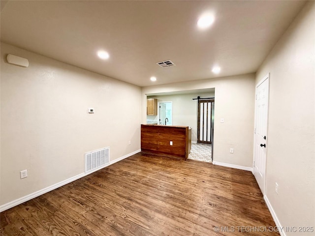 206 S 2nd St, Eufaula, OK 74432 - unfurnished room featuring dark wood-style floors and recessed lighting