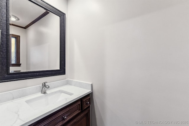 2151 E 27th St, Tulsa, OK 74114 - bathroom with crown molding and vanity