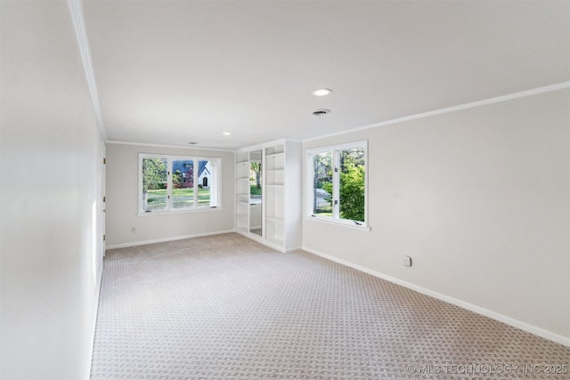 2151 E 27th St, Tulsa, OK 74114 - unfurnished room featuring ornamental molding, light colored carpet, and recessed lighting