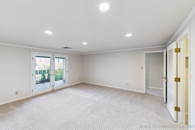 2151 E 27th St, Tulsa, OK 74114 - unfurnished room featuring ornamental molding, light colored carpet, and recessed lighting