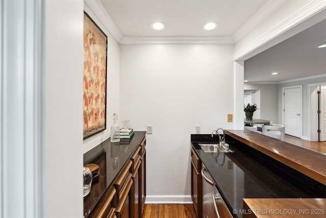 2151 E 27th St, Tulsa, OK 74114 - indoor wet bar featuring wood finished floors, recessed lighting, and crown molding