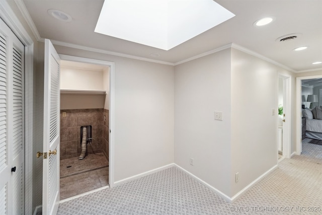 2151 E 27th St, Tulsa, OK 74114 - hallway featuring a skylight, carpet flooring, and recessed lighting