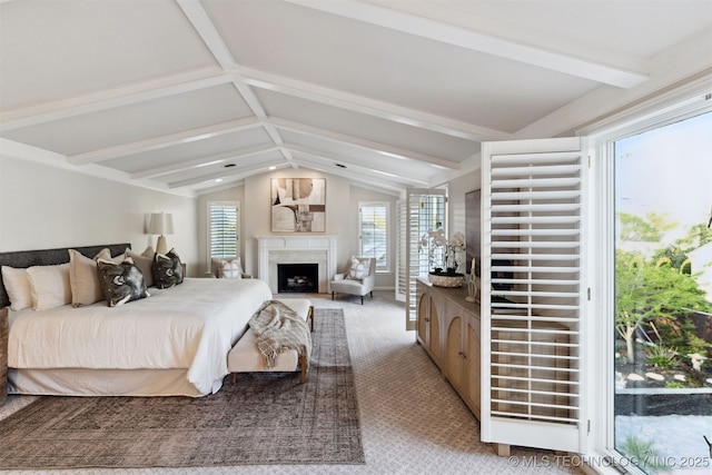 2151 E 27th St, Tulsa, OK 74114 - bedroom with carpet floors and a high end fireplace