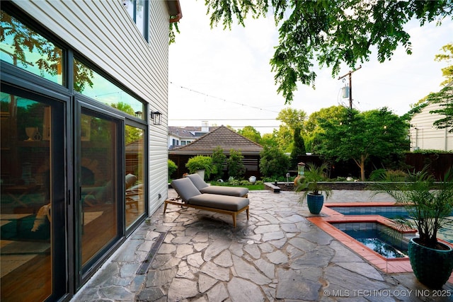 2151 E 27th St, Tulsa, OK 74114 - view of patio with a pool with connected hot tub