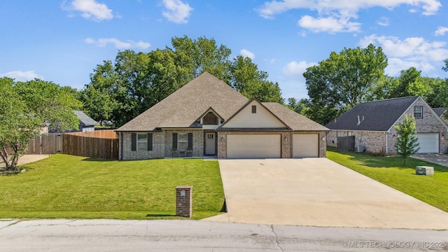 8035 Tims Ln, Claremore, OK 74019 - view of front of home featuring an attached garage, driveway, and brick siding