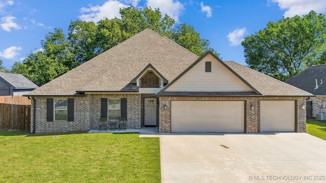 8035 Tims Ln, Claremore, OK 74019 - view of front of home with an attached garage, driveway, and brick siding