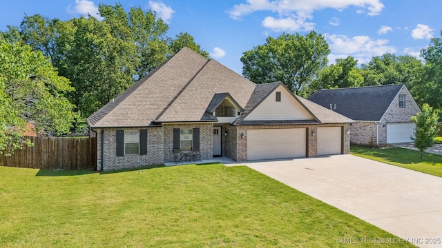 8035 Tims Ln, Claremore, OK 74019 - view of front of house with brick siding, a garage, concrete driveway, and a shingled roof