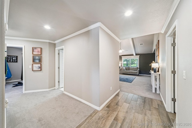 8035 Tims Ln, Claremore, OK 74019 - hallway featuring ornamental molding, wood finished floors, recessed lighting, and carpet floors
