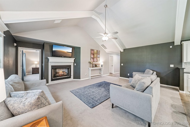 8035 Tims Ln, Claremore, OK 74019 - living area with a lit fireplace, a ceiling fan, and light carpet