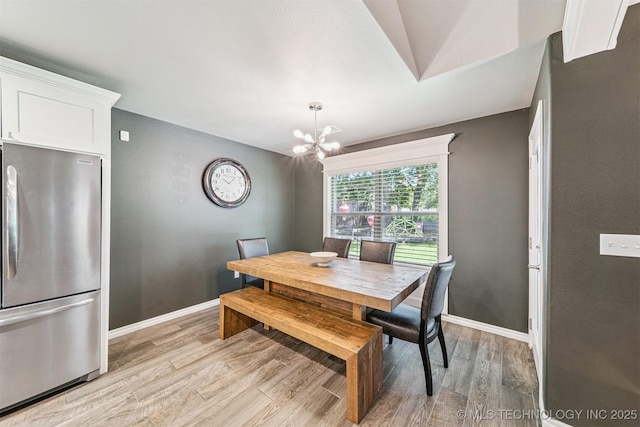 8035 Tims Ln, Claremore, OK 74019 - dining area featuring a chandelier and light wood-style floors