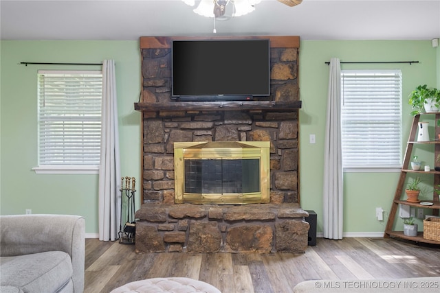 70155 S 336th Ct, Wagoner, OK 74467 - living room with ceiling fan, wood finished floors, and a fireplace