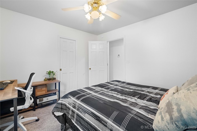 70155 S 336th Ct, Wagoner, OK 74467 - carpeted bedroom with a desk and a ceiling fan