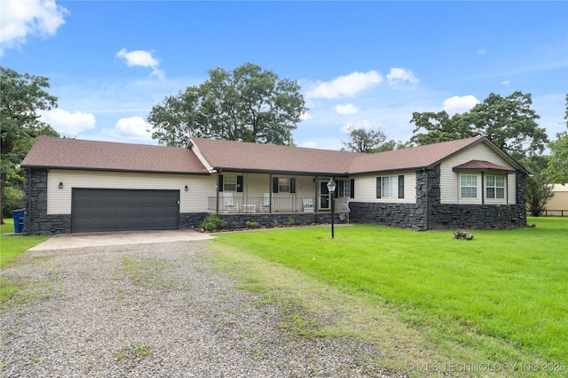 70155 S 336th Ct, Wagoner, OK 74467 - ranch-style home with a porch, driveway, stone siding, a front yard, and a garage