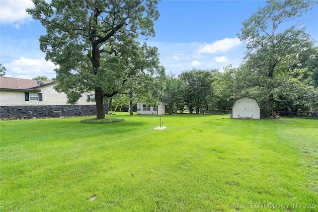 70155 S 336th Ct, Wagoner, OK 74467 - view of green lawn featuring a shed