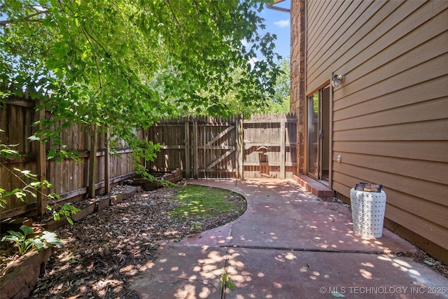 2807 E 90th St Unit 4, Tulsa, OK 74137 - view of yard with a patio and a gate